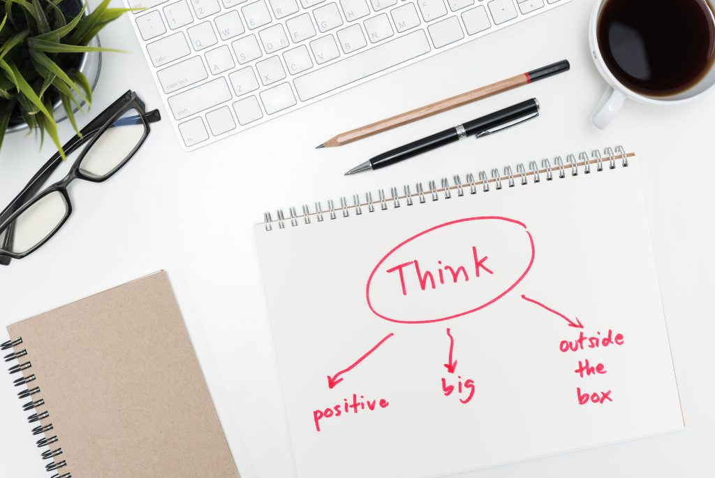 notepad, think big, think positive, think outside the box