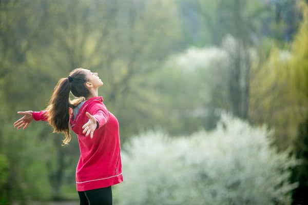 Breathing and balance, woman focused on breath