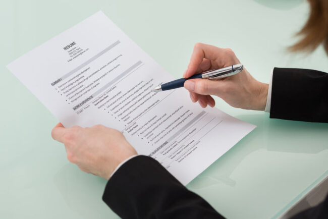 Résumé bullets - person reviewing résumé