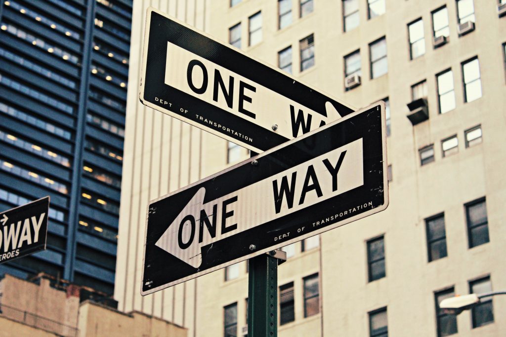 Two one-way street signs representing The Great Shift